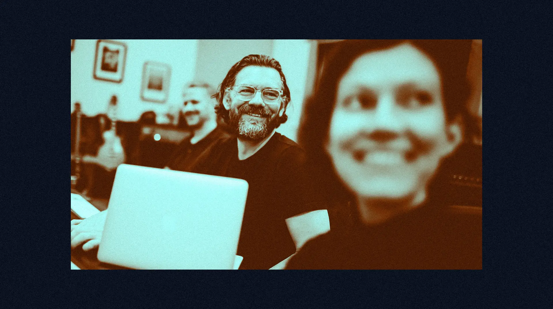 Musicians celebrating in the studio after a successful move